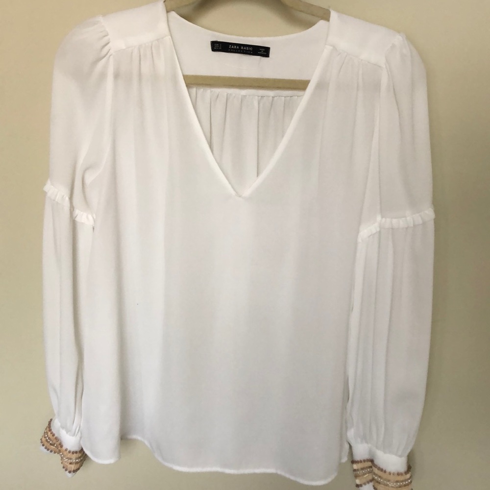 White blouse with sleeve detail